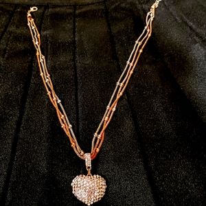 Gold, rose gold, and silver necklace ft. a large, diamond gemstone,heart pendant